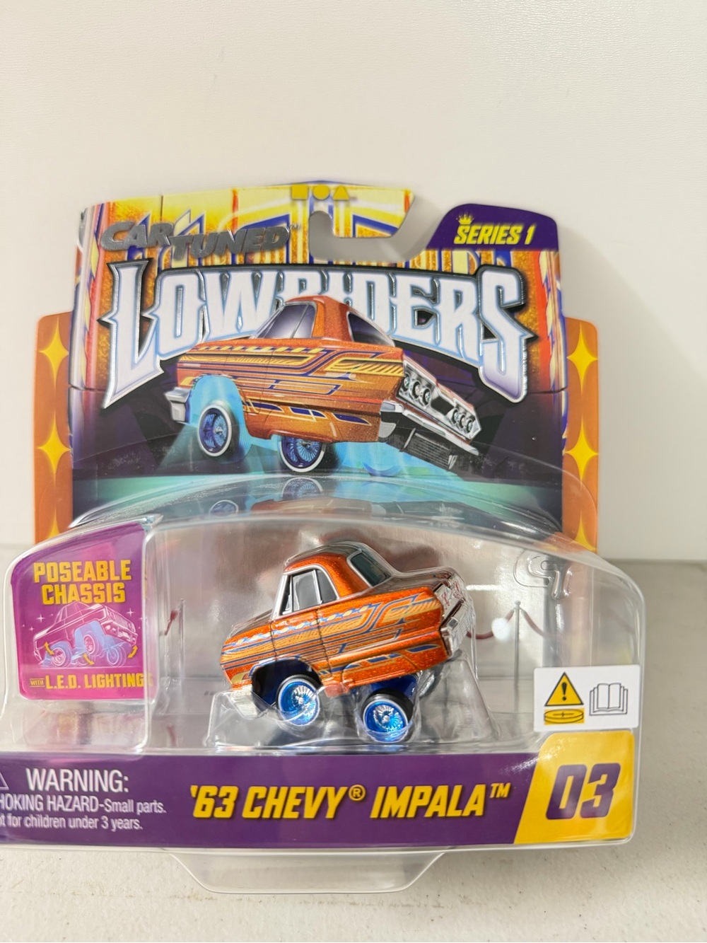 Riders by Lee '63 Chevy Impala Toy Car - Orange with Blue Wheels